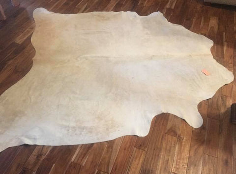 Trevor Cream Cow Hide